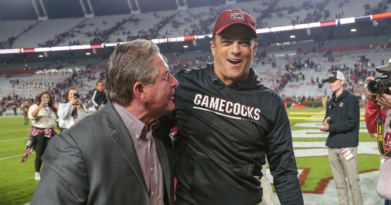 South Carolina head coach Shane Beamer celebrates with Ray Tanner after a game (Photo: Chris Gillespie | GamecockCentral.com)