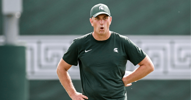 Michigan State's offensive coordinator Brian Lindgren works with the quarterbacks during the first day of football camp on Tuesday, July 30, 2024, in East Lansing - Nick King, USA TODAY Sports
