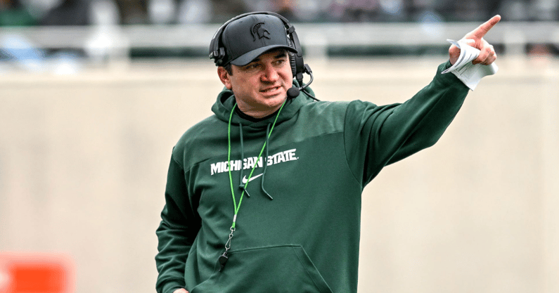 Michigan State's head coach Jonathan Smith communicates with staff on Saturday, April 20, 2024, at Spartan Stadium in East Lansing - Nick King, USA TODAY Sports
