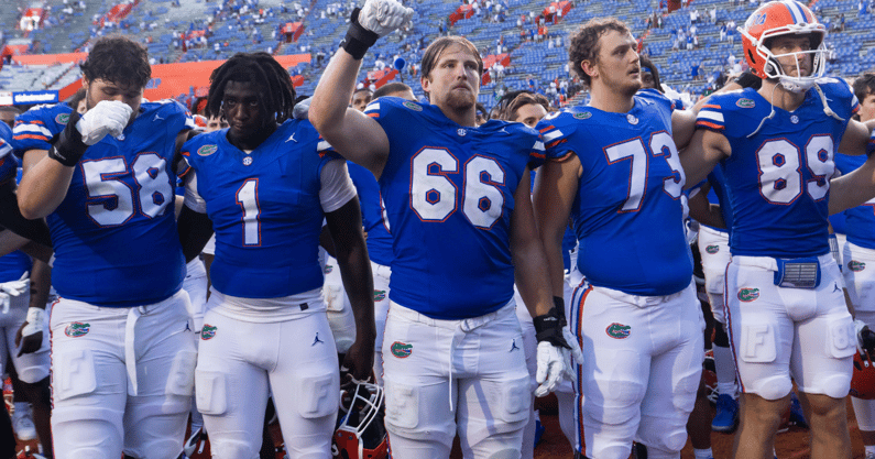 Florida gathered in the North end zone for the song “We are the Boys” during the season opener at Ben Hill Griffin Stadium in Gainesville, FL on Saturday, August 31, 2024 against the University of Miami Hurricanes. The Hurricanes defeated the Gators 41-17. [Doug Engle/Gainesville Sun]