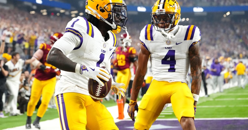 Sep 1, 2024; Paradise, Nevada, USA; LSU Tigers wide receiver Aaron Anderson (1) celebrates with wide receiver CJ Daniels (4) after scoring a touchdown against the Southern California Trojans during the third quarter at Allegiant Stadium. Mandatory Credit: Stephen R. Sylvanie-USA TODAY Sports