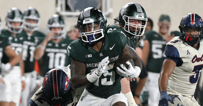 Michigan State Spartans running back Kay'Ron Lynch-Adams (15) runs for a first down in the game against the Florida Atlantic Owls at Spartan Stadium. - Dale Young, USA TODAY Sports