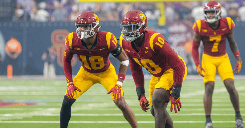 USC defenders Eric Gentry, Jamil Muhammad and Kamari Ramsey prepare for the snap during a game against LSU in Las Vegas