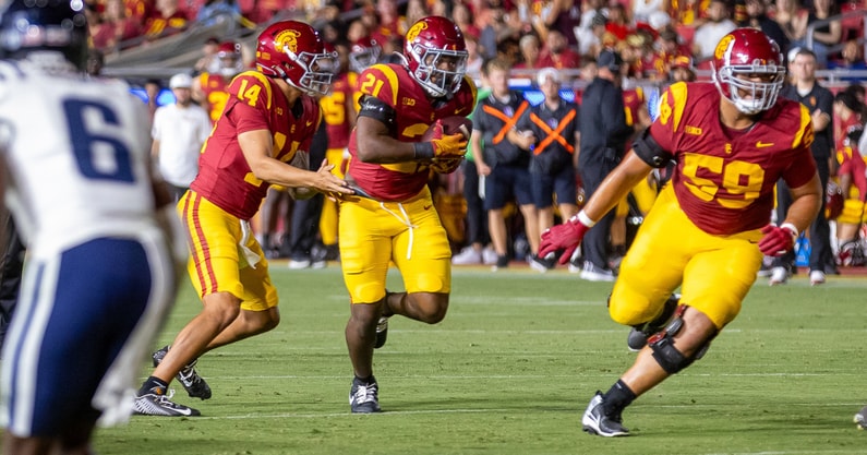 USC running back Bryan Jackson carries the ball for the Trojans against Utah State