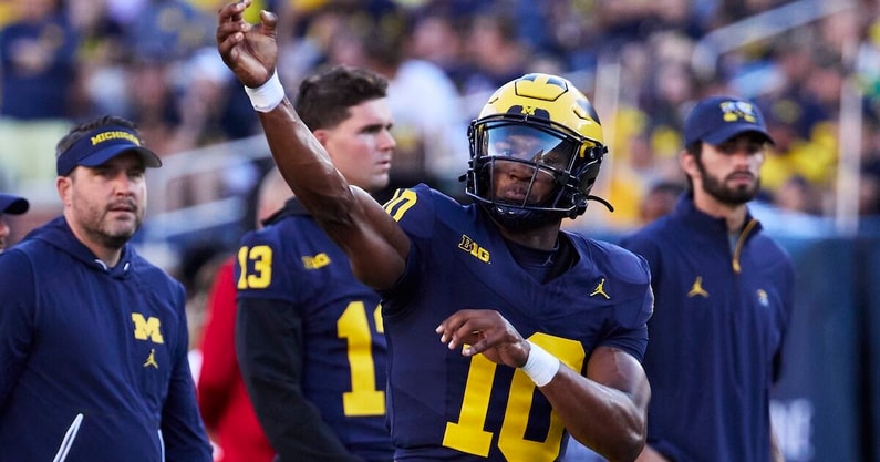 Aug 31, 2024; Ann Arbor, Michigan, USA; Michigan Wolverines quarterback Alex Orji (10) warms up before the game against the Fresno State Bulldogs at Michigan Stadium. Mandatory Credit: Rick Osentoski-USA TODAY Sports