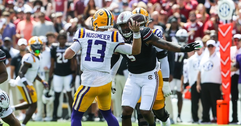 South Carolina QB Kyle Kennard chases down LSU QB Garrett Nussmeier (Photo: Katie Dugan | GamecockCentral.com)