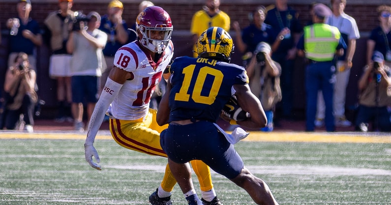 USC linebacker Eric Gentry lines up a tackle against Michigan quarterback Alex Orji