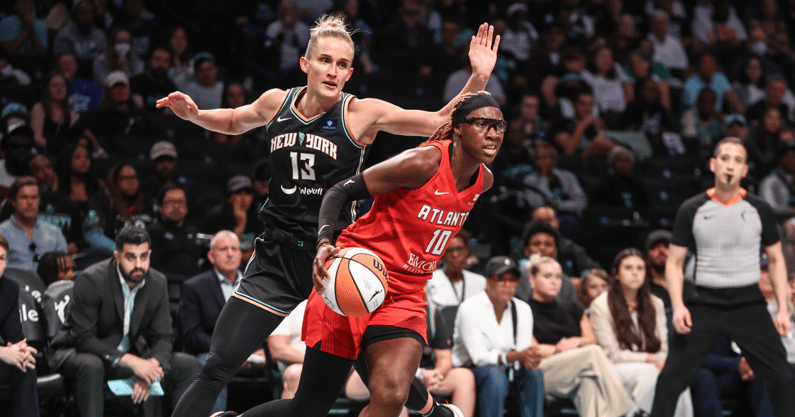 Atlanta Dream guard Rhyne Howard (10) drives past New York Liberty forward Leonie Fiebich (13) during game one of the first round of the 2024 WNBA Playoffs at Barclays Center - Wendell Cruz, Imagn Images
