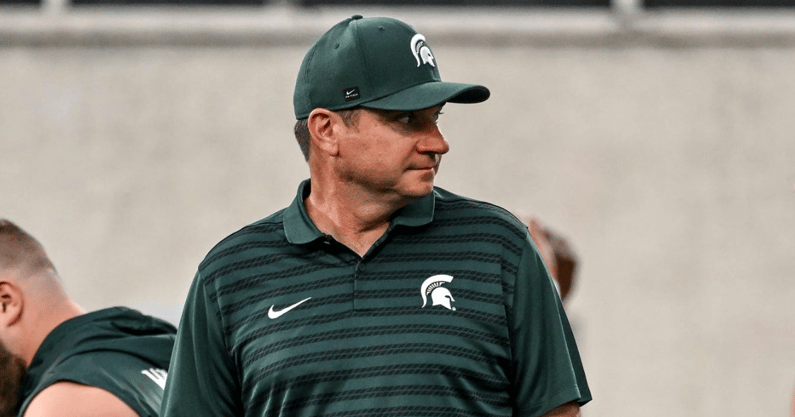 Michigan State's head coach Jonathan Smith looks on during team warm ups before the game against Florida Atlantic on Friday, Aug. 30, 2024, at Spartan Stadium in East Lansing - Nick King, USA TODAY Sports