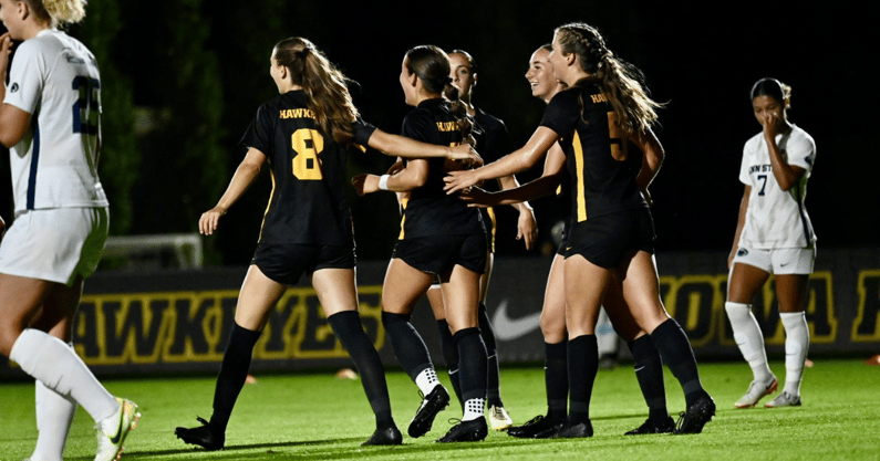 Iowa forward Maya Hansen celebrates with her teammates after a first half goal against Penn State. (Photo by Dennis Scheidt)