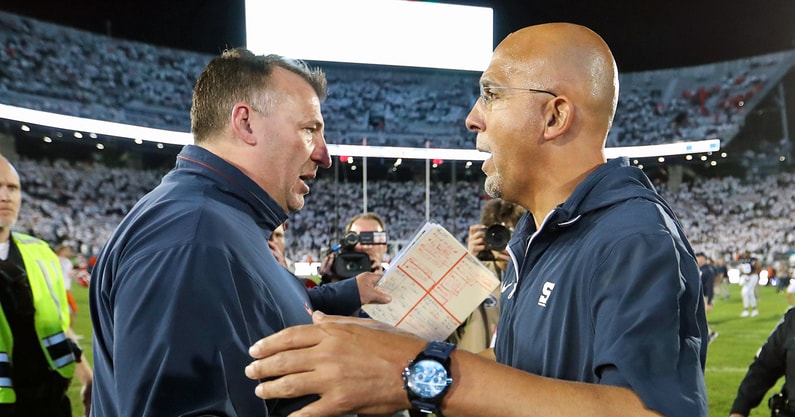 Penn State Nittany Lions head coach James Franklin (right) shakes hands with Illinois Fighting Illini head coach Bret Bielema following a game at Beaver Stadium. Penn State defeated Illinois 21-7. (Mandatory Credit: Matthew O'Haren-Imagn Images)