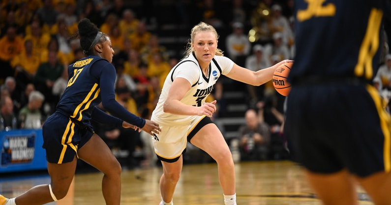 Iowa forward Syd Affolter drives to the basket against West Virginia. (Photo by Dennis Scheidt)