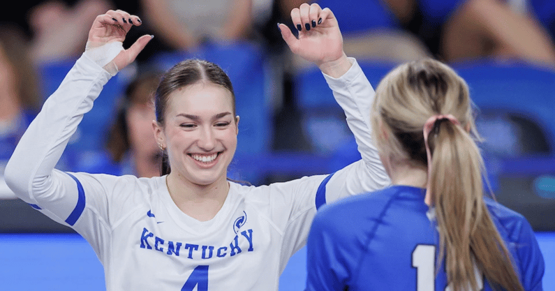 Emma Grome celebrates after winning a point against Missouri - UK Athletics