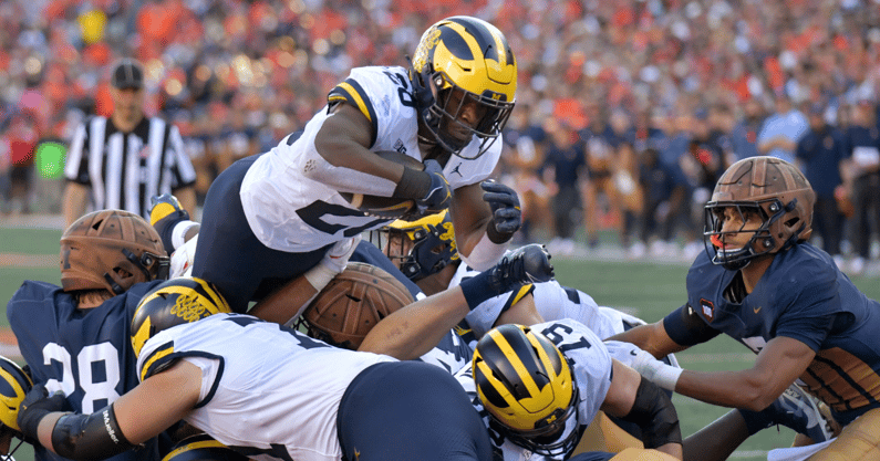 Michigan Wolverines football running back Kalel Mullings scored on a fourth down at Illinois. (Photo by Ron Johnson-Imagn Images)