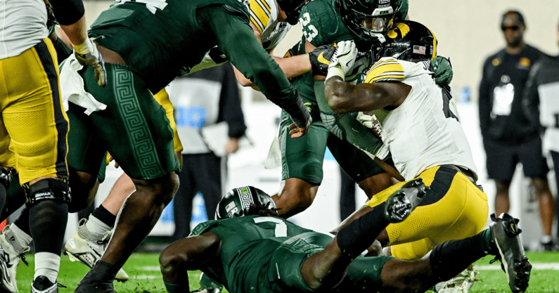 Mi Solves Michigan State solves Iowa run game by upping physicality, playing team ...