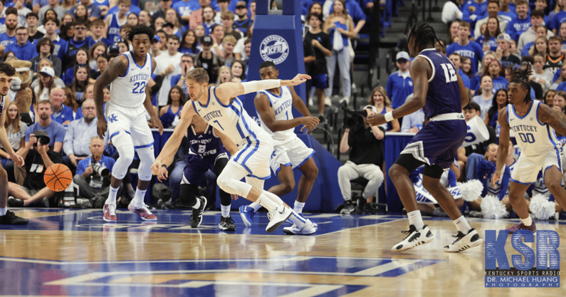Kentucky forward Andrew Carr goes after a loose ball during a game - Dr. Michael Huang, Kentucky Sports Radio