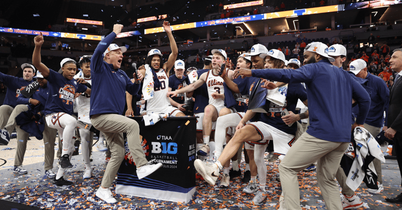 The Illinois Fighting Illini celebrate after defeating Wisconsin Badgers at Target Center in the 2023-24 Big Ten conference championship game