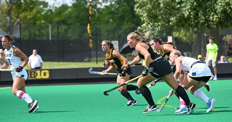 The Hawkeyes attack on a penalty corner against Delaware. (Photo by Dennis Scheidt)