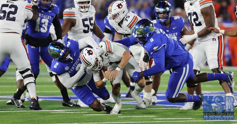 Kentucky defenders tackling Auburn player - Dr. Michael Huang, Kentucky Sports Radio