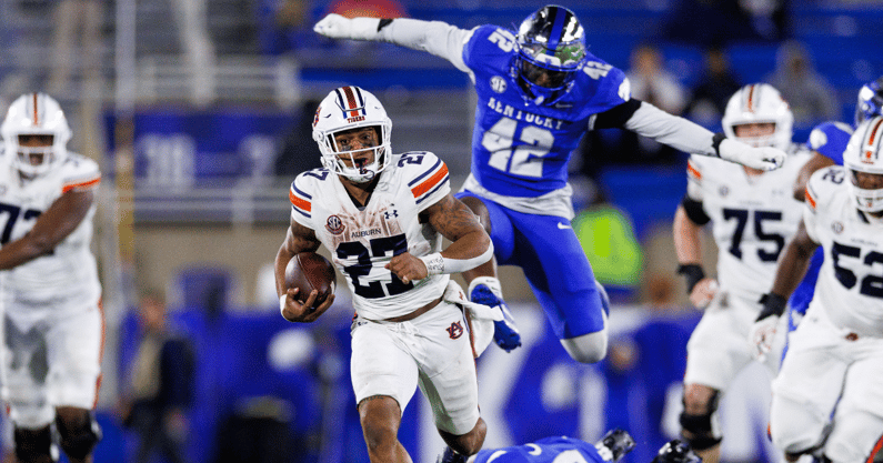 Oct 26, 2024; Lexington, Kentucky, USA; Auburn Tigers running back Jarquez Hunter (27) runs the ball during the fourth quarter against the Kentucky Wildcats at Kroger Field. Mandatory Credit: Jordan Prather-Imagn Images