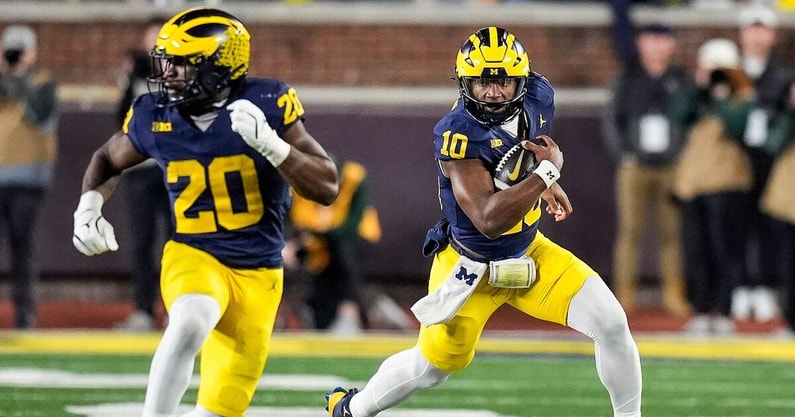 Michigan quarterback Alex Orji (10) runs against Michigan State during the second half at Michigan Stadium in Ann Arbor on Saturday, Oct. 26, 2024. (Junfu Han/Detroit Free Press)