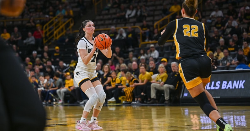 Iowa guard Taylor McCabe attempts a three-pointer against Missouri Western. (Photo by Dennis Scheidt)