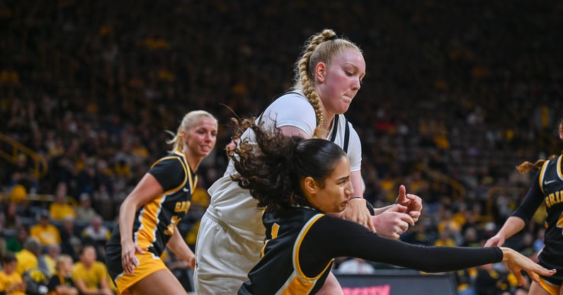 Iowa center Addi O'Grady battles for a rebound against MWSU. (Photo by Dennis Scheidt)