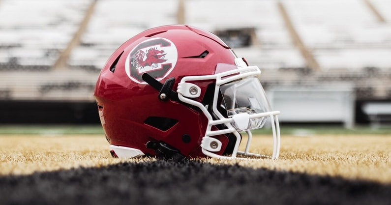 South Carolina football's new-look garnet helmet with white facemask. Photo by: University of South Carolina; @GamecockFB on Twitter/X