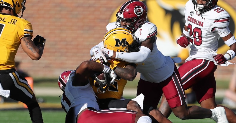 South Carolina defenders make a tackle against Missouri (Photo: CJ Driggers | GamecockCentral.com)