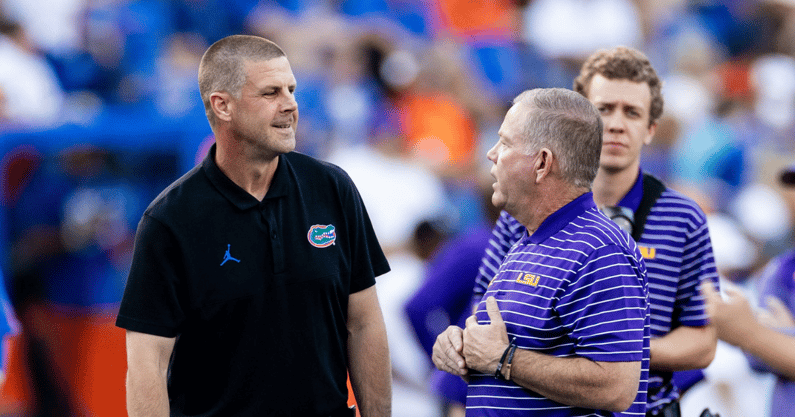 Florida Gators head coach Billy Napier and LSU Tigers head coach Brian Kelly talk before the game at Steve Spurrier Field at Ben Hill Griffin Stadium in Gainesville, FL on Saturday, October 15, 2022. [Matt Pendleton/Gainesville Sun] Ncaa Football Florida Gators Vs Lsu Tigers