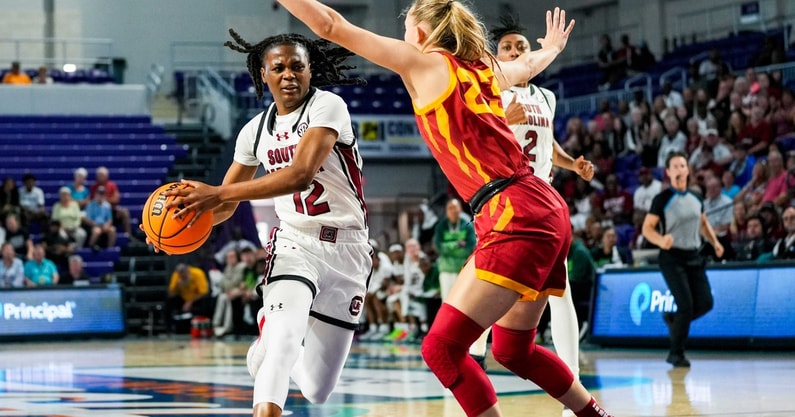 South Carolina Gamecocks guard MiLaysia Fulwiley (12) drives to the basket as Iowa State Cyclones guard Kelsey Joens (23) guards her during the first quarter of a Fort Myers Tip-Off Island Division game at Suncoast Credit Union Arena in Fort Myers, Fla., on Thursday, Nov. 28, 2024. © Jonah Hinebaugh/The News-Press/USA Today Network-Florida / USA TODAY NETWORK via Imagn Images