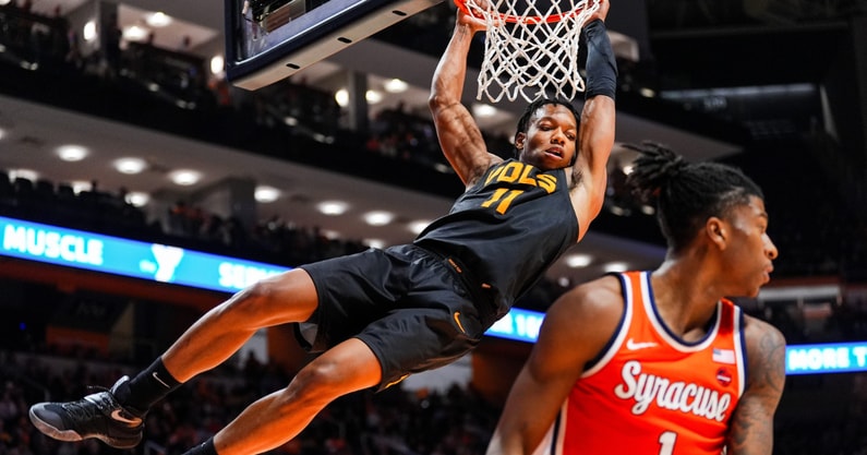 Tennessee guard Jordan Gainey (11) hangs from the rim after dunking the ball during a college basketball game between Tennessee and Syracuse held at Thompson-Boling Arena at Food City Center in Knoxville, Tenn., on Tuesday, Dec. 3, 2024 - © Brianna Paciorka/News Sentinel / USA TODAY NETWORK via Imagn Images