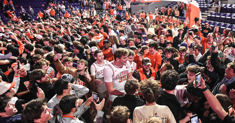 Clemson fans storm the court after beating Kentucky - Ken Ruinard, Imagn Images