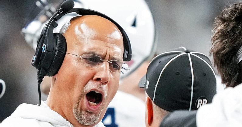 Penn State Nittany Lions head coach James Franklin speaks with an official Saturday, Dec. 7, 2024, during the Big Ten Championship game between the Oregon Ducks and the Penn State Nittany Lions at Lucas Oil Stadium in Indianapolis. The Ducks defeated the Nittany Lions, 45-37. (© Grace Smith/IndyStar / USA TODAY NETWORK via Imagn Images)