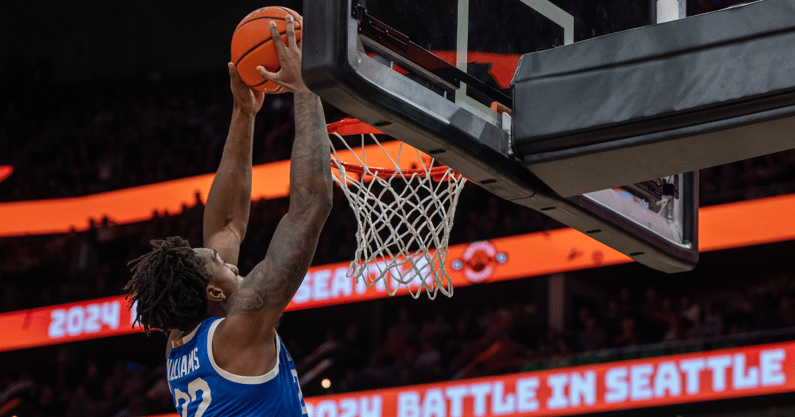Dec 7, 2024; Seattle, Washington, USA; Kentucky Wildcats center Amari Williams (22) dunks the ball during the second half against the Gonzaga Bulldogs at Climate Pledge Arena. Mandatory Credit: Stephen Brashear-Imagn Images