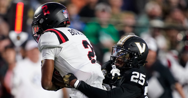 Ball State wide receiver Justin Bowick (2) is stopped by Vanderbilt cornerback Martel Hight (25) during the first quarter at FirstBank Stadium in Nashville, Tenn., Saturday, Oct. 19, 2024. © Andrew Nelles / The Tennessean / USA TODAY NETWORK via Imagn Images