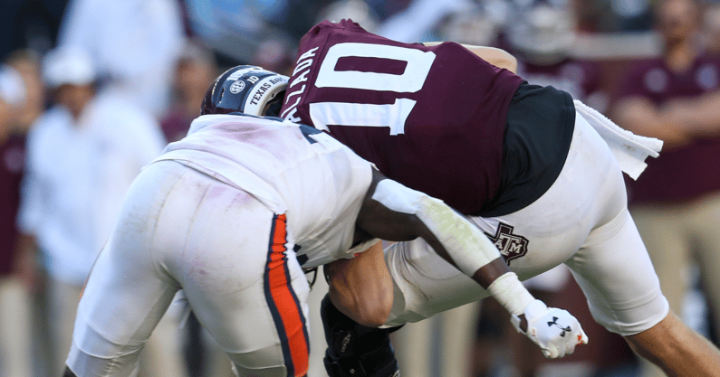 Zach Calzada lowers his shoulder, via Thomas Shea, Imagn Images