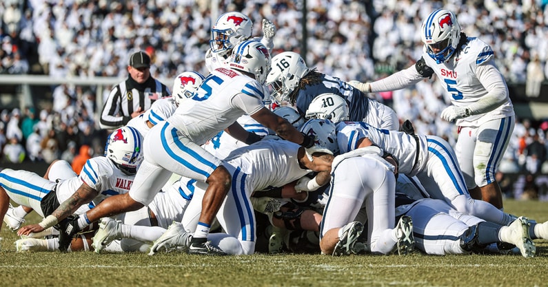 Southern Methodist Mustangs stops Penn State Nittany Lions offense on a fourth down during the first half at Beaver Stadium. (Mandatory Credit: Vincent Carchietta-Imagn Images)