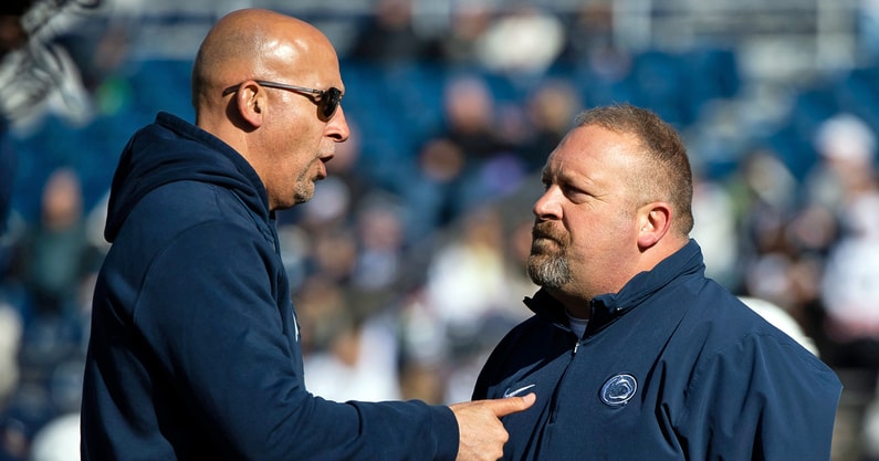Penn State head football coach James Franklin (left) and former special teams coordinator Stacy Collins speak together before an NCAA football game against Rutgers Saturday, Nov. 18, 2023, in State College, Pa. (Dan Rainville / USA TODAY NETWORK)