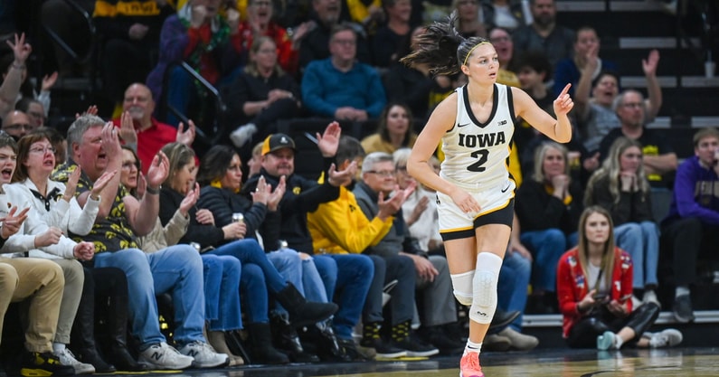 Iowa guard Taylor McCabe reacts to a made three-pointer against Northern Iowa. (Photo by Dennis Scheidt)