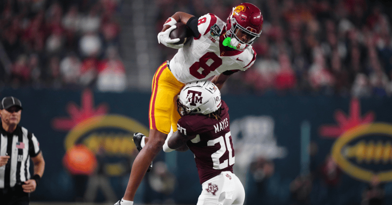 USC Trojans wide receiver Ja'Kobi Lane (8) catches the ball against Texas A&M Aggies defensive back BJ Mayes (20) in the second half at Allegiant Stadium