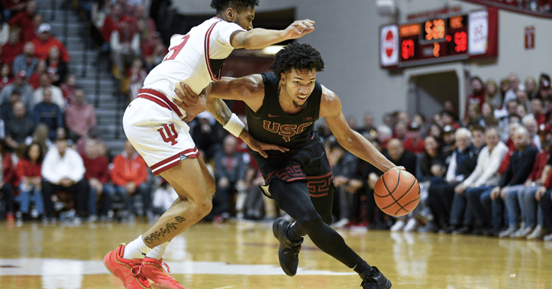 USC Trojans guard Desmond Claude (1) dribbles the ball against Indiana Hoosiers guard Kanaan Carlyle (9) during the second half at Simon Skjodt Assembly Hall