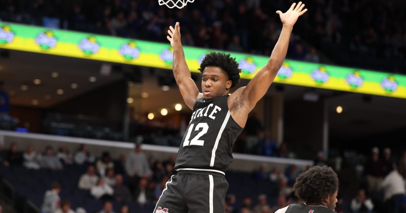 Dec 21, 2024; Memphis, Tennessee, USA; Mississippi State Bulldogs guard Josh Hubbard (12) reacts after a dunk during the second half against the Memphis Tigers at FedExForum. Mandatory Credit: Wesley Hale-Imagn Images