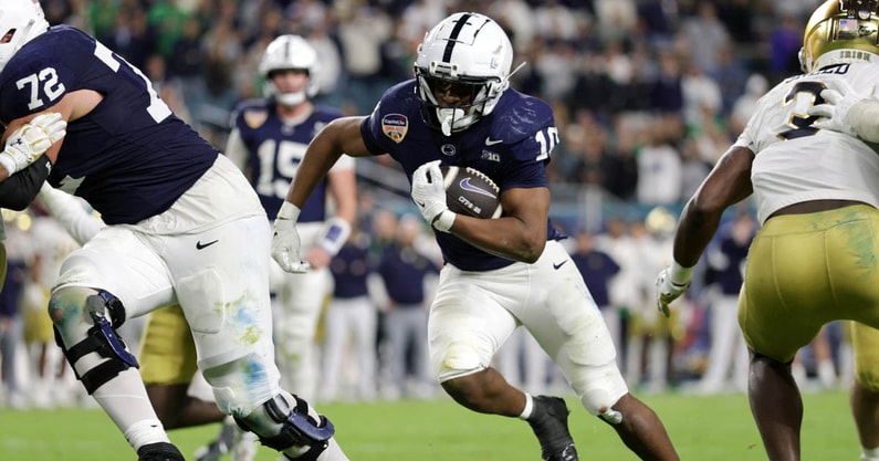 Penn State Nittany Lions running back Nicholas Singleton (10) runs the ball in the second half against the Notre Dame Fighting Irish in the Orange Bowl at Hard Rock Stadium. (Mandatory Credit: Nathan Ray Seebeck-Imagn Images)