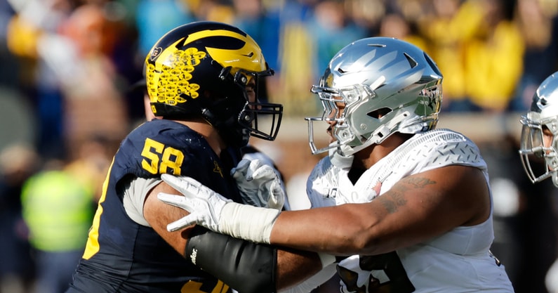 Michigan Wolverines football offensive lineman Giovanni El-Hadi will return for a fifth season in 2025. (Photo by Rick Osentoski-Imagn Images)