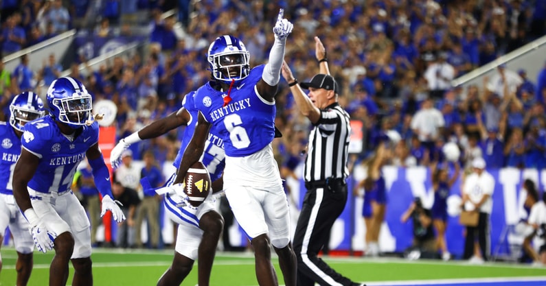 Aug 31, 2024; Lexington, Kentucky, USA; Kentucky Wildcats defensive back JQ Hardaway (6) celebrates after an interception in the end zone against Southern Miss Golden Eagles during the second quarter at Kroger Field. Mandatory Credit: Carter Skaggs-Imagn Images
