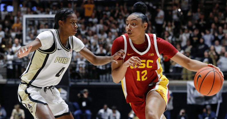 Purdue Boilermakers guard Destini Lombard (4) defends USC Trojans guard JuJu Watkins (12) Wednesday, Jan. 22, 2025, during the NCAA women’s basketball game at Mackey Arena in West Lafayette, Ind. USC Trojans won 79-37