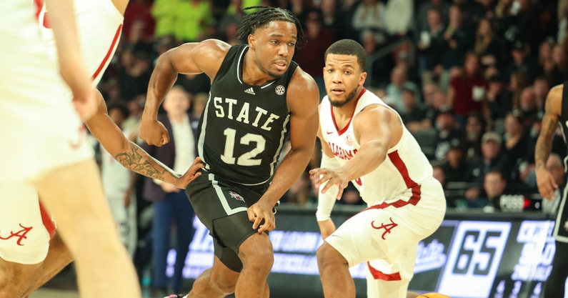 Chris Youngblood guards Josh Hubbard