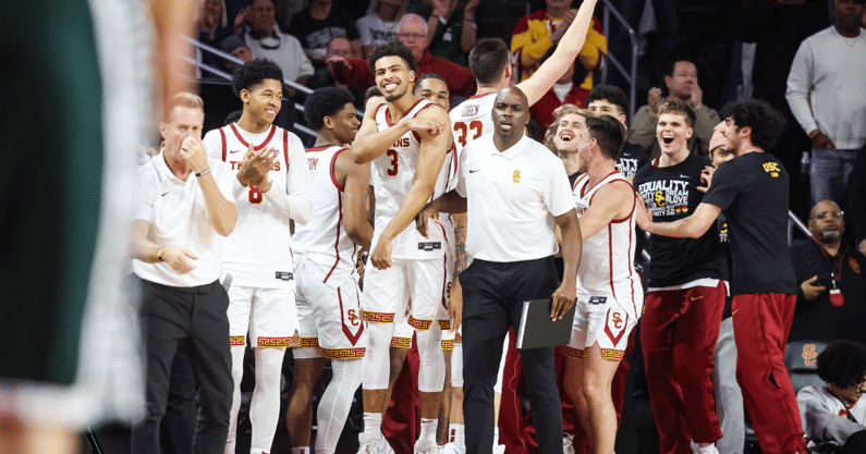 USC Trojan players celebrate during a victory over the Michigan State Spartans at Galen Center