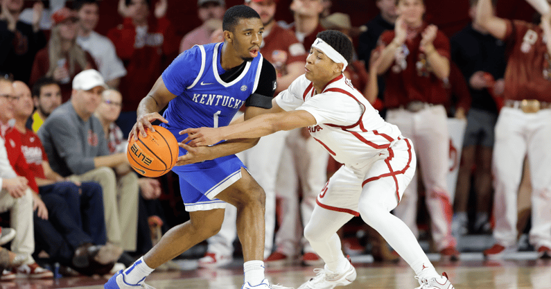 Kentucky Wildcats guard Lamont Butler (1) moves the ball as Oklahoma Sooners guard Jeremiah Fears (0) defends during the second half at Lloyd Noble Center. Mandatory Credit: Alonzo Adams-Imagn Images